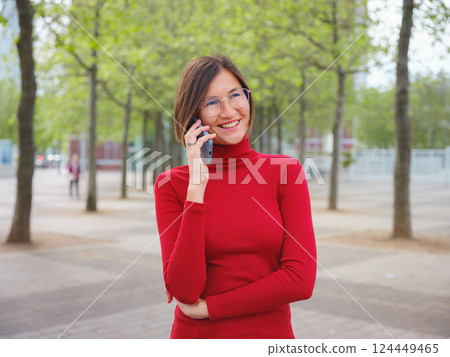 Woman in glasses stands in center of Frankfurt, Woman in glasses stands in center of Frankfurt, 124449465