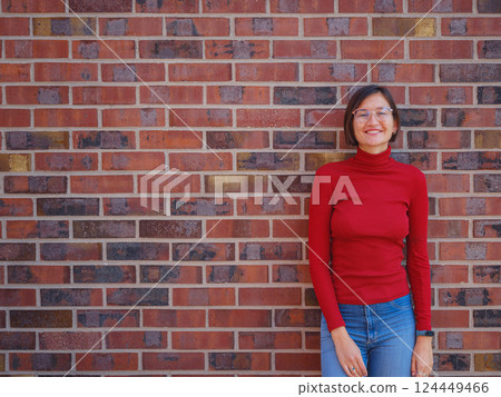 Woman in glasses stands in center of Frankfurt, Woman in glasses stands in center of Frankfurt, 124449466
