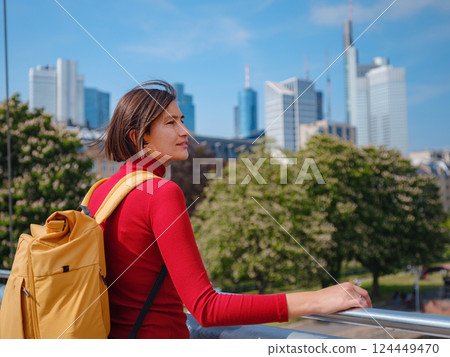 Tourist woman explores modern Frankfurt, Tourist woman explores modern Frankfurt, 124449470