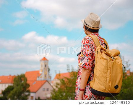 Woman Walking Through the Historic Center of Varazdin 124449510
