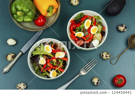 Vegetable salad with quail eggs. Vegetable salad with quail eggs. 124450441