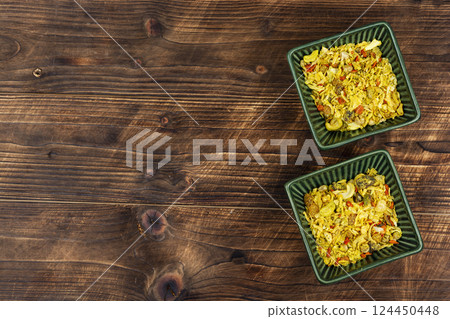 Bowls with colorful powders and spices. 124450448