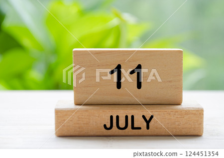 July 11th calendar text on wooden blocks with customizable space for text. Calendar concept. 124451354