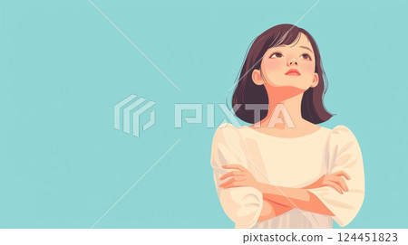 A thoughtful woman stands with arms crossed against a light blue background 124451823