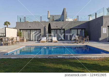modern house with pool 124451905
