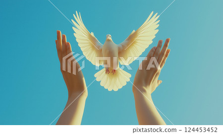 Woman releasing white dove into clear blue sky, symbolizing peace, freedom and hope 124453452