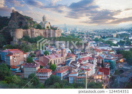 Landscape of old town Tbilisi and Metekhi Church on the background of spectacular blue sky  124454351
