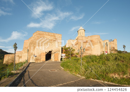 The Virgin Mary Assumption Church of Metekhi in Tbilisi on the background of blue sky 124454826