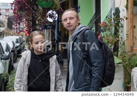 Happy family together. Young girl daughter and her father portrait 124454849