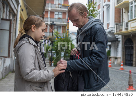 Happy family together. Young girl daughter and her father portrait 124454850