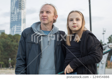 Happy family together. Young girl daughter and her father portrait Happy family together. Young girl daughter and her father portrait 124454866