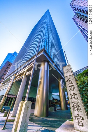 Tokyo cityscape in Japan, with a view of Toranomon-Kotohira Tower and Kotohira Shrine. (Toranomon Hills Station is in the background on the left side of the screen.) Tokyo cityscape in Japan, with a view of Toranomon-Kotohira Tower and Kotohira Shrine. (Toranomon Hills Station is in the background on the left side of the screen.) 124454935