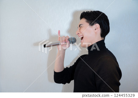 A man sang at a karaoke 124455329