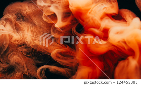 Underwater smoke. Art vapor. Orange brown mist cloud flow on black background. Color paint fume spread fantasy swirl abstract blur liquid curl. 124455393