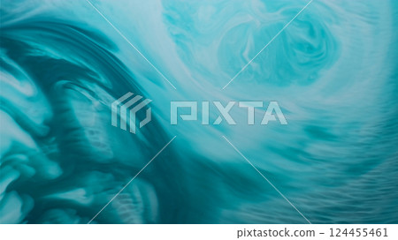 Underwater splash. Acrylic stream. Defocused blue fantasy color marbling flow mix paint in water spreading on abstract art background. 124455461