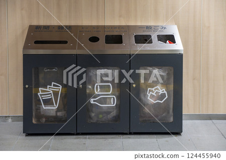 Sorting trash bins on subway platforms 124455940