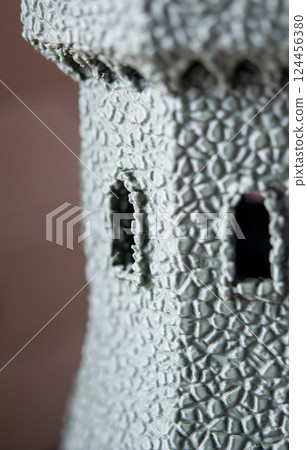 Small object created from molten plastic on 3D printer. Three-dimensional model printed on 3D printer from plastic. Modern new 3d printing technology. FDM technology. Additive progressive technologies Small object created from molten plastic on 3D printer. Three-dimensional model printed on 3D printer from plastic. Modern new 3d printing technology. FDM technology. Additive progressive technologies 124456380