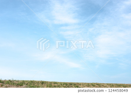Refreshing blue sky and meadow Refreshing blue sky and meadow 124458049