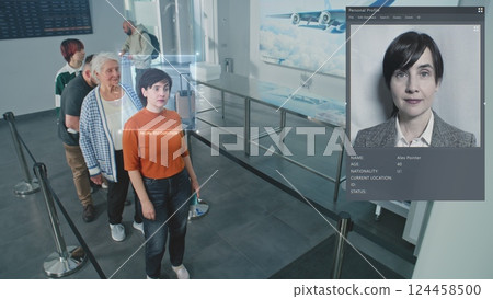 Airport Checkpoint: Multiethnic People Passing AI Biometric Facial Recognition at Passport Control 124458500