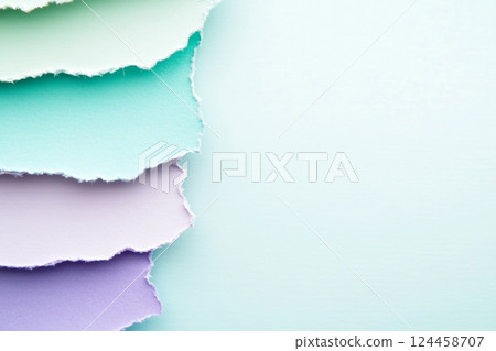 Textured paper layers in mint green and lavender create an artistic and minimal design aesthetic 124458707