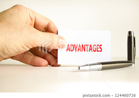 Advantages symbol. Concept word Advantages on beautiful white card. Beautiful wooden background. Businessman hand. Beautiful black pen. Business advantages concept. Copy space. Advantages symbol. Concept word Advantages on beautiful white card. Beautiful wooden background. Businessman hand. Beautiful black pen. Business advantages concept. Copy space. 124460716