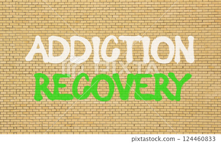 Addiction recovery symbol. Concept words Addiction recovery on beautiful brick wall. Beautiful brick wall background. Psychology addiction recovery concept. Copy space. 124460833