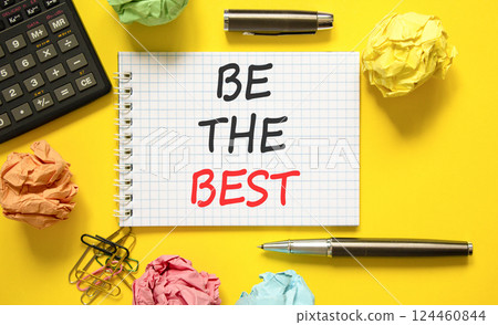 Motivational be the best symbol. Concept words Be the best on beautiful white note. Beautiful yellow background. Black pen. Black calculator. Business motivational be the best concept. Copy space. 124460844