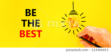 Motivational be the best symbol. Concept words Be the best on beautiful yellow paper. Beautiful yellow background. Businessman hand. Light bulb. Business motivational be the best concept. Copy space. 124460853