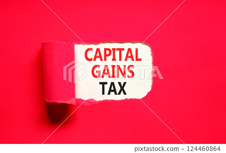 Capital gains tax symbol. Concept words Capital gains tax on beautiful white paper. Beautiful red paper background. Business and capital gains tax concept. Copy space. 124460864