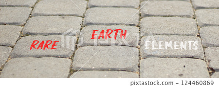 Rare earth elements symbol. Concept words Rare earth elements on beautiful grey road break. Beautiful grey road break background. Business and rare earth elements concept. Copy space. 124460869