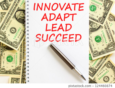 Innovate adapt lead succeed symbol. Concept words Innovate Adapt Lead Succeed on beautiful white note. Beautiful dollar bills background. Business innovate adapt lead succeed concept. Copy space. Innovate adapt lead succeed symbol. Concept words Innovate Adapt Lead Succeed on beautiful white note. Beautiful dollar bills background. Business innovate adapt lead succeed concept. Copy space. 124460874