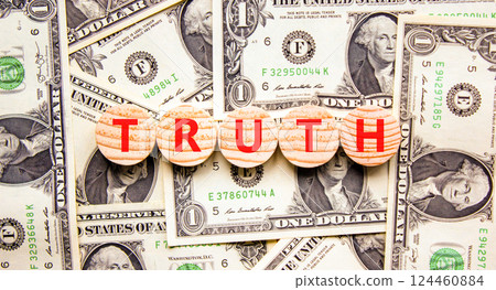 Truth symbol. Concept word Truth on beautiful wooden circles. Beautiful dollar bills. Beautiful background from dollar bills. Business lifestyle truth concept. Copy space. 124460884