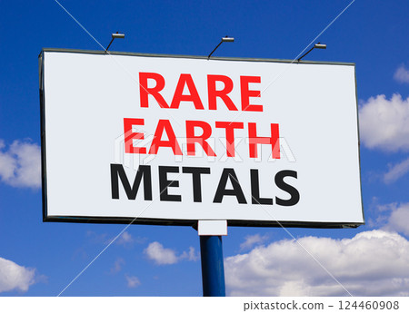 Rare earth metals symbol. Concept words Rare earth metals on beautiful big white billboard. Beautiful blue sky clouds background. Business and rare earth metals concept. Copy space. 124460908