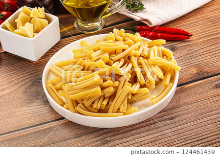 Raw dry Italian pasta - casarecce Raw dry Italian pasta - casarecce 124461439