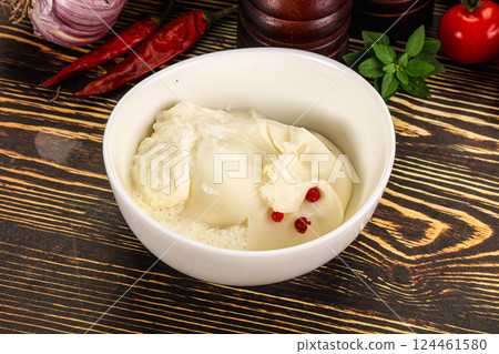 Italian soft young cheese burrata Italian soft young cheese burrata 124461580