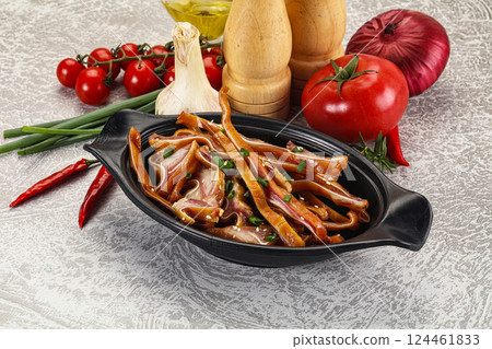 Sliced smoked pork ear snack Sliced smoked pork ear snack 124461833