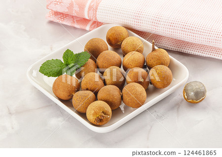 Tropical delicous fruit Longan heap 124461865