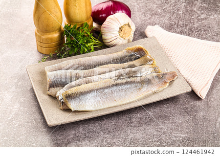 Marinated salted herring fillet apetizer Marinated salted herring fillet apetizer 124461942