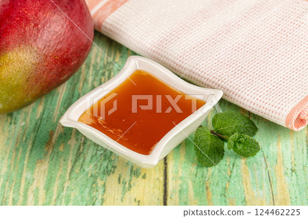 Sweet dessert orange mango puree Sweet dessert orange mango puree 124462225