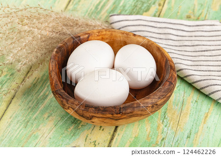 Raw white uncooked chicken eggs Raw white uncooked chicken eggs 124462226