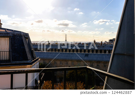 Open window with view of rooftops and Eiffel Tower in Paris, France Open window with view of rooftops and Eiffel Tower in Paris, France 124462887