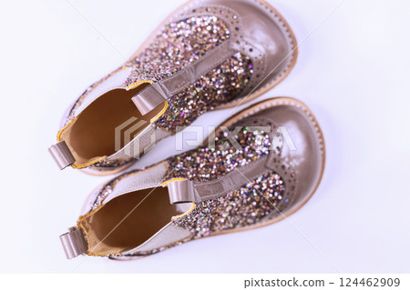 Little kids boots with glitter on white 124462909