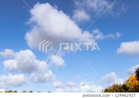 Beautiful white clouds on blue sky 124462917