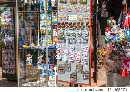 Souvenir shop for tourists in Copenhagen with symbols of Denmark. 124462974