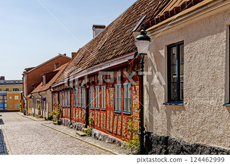 Narrow streets of the old town with colorful houses. 124462999