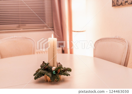 Christmas advent candle whith numbers. Christmas decor and holiday preparations 124463030