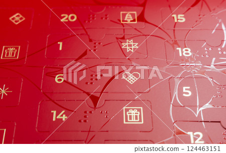 Red advent calendar for kids and adults with sweets 124463151