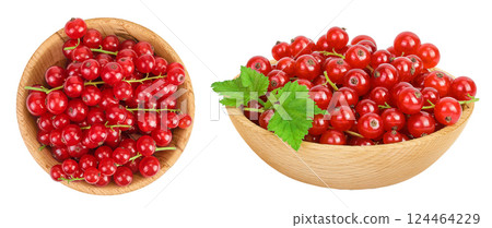 Red currant berries in a wooden bowl isolated on white background. Top view. Flat lay 124464229