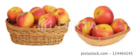 Ripe nectarine fruit in a wicker basket isolated on white background with full depth of field Ripe nectarine fruit in a wicker basket isolated on white background with full depth of field 124464245