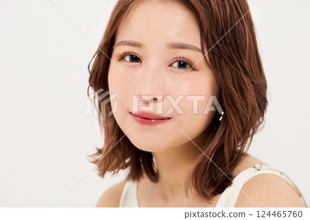 Cute woman with beauty makeup Cute woman with beauty makeup 124465760